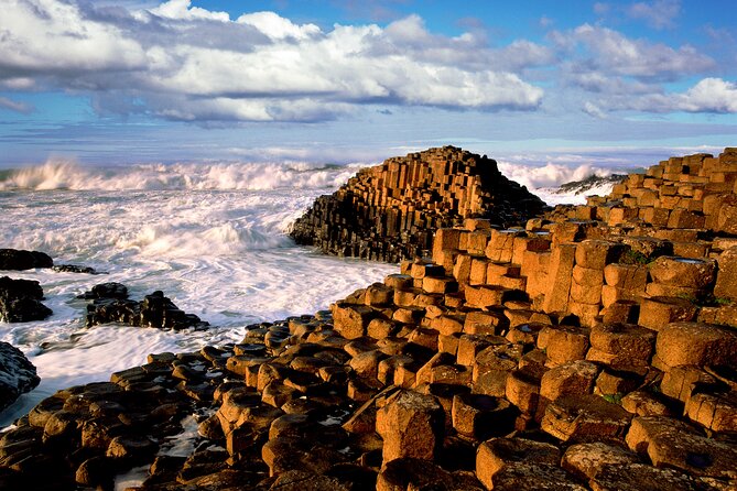 Chauffeur Giants Causeway & Belfast Private Day Tour From Dublin - Dunluce Castle: quick photo stop with dramatic payoff