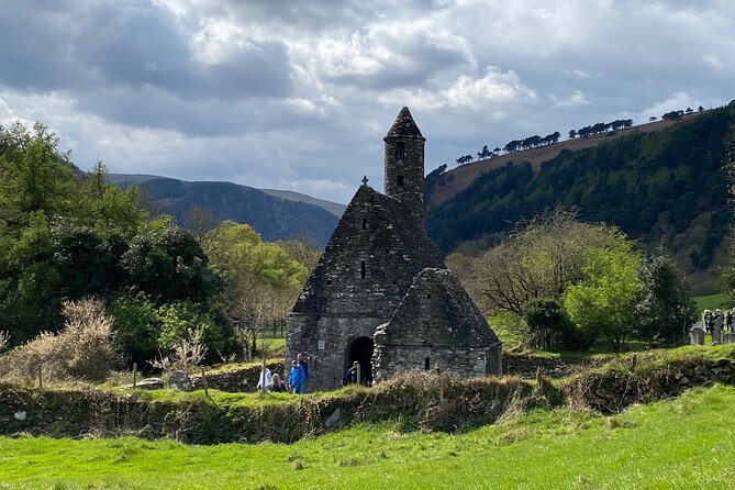 Day Tour from Dublin: Wicklow Mountains, Glendalough, Powerscourt - Guinness Lake (Lough Tay): pint-shaped scenery with stories attached
