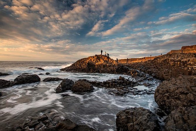 Dublin to Dunluce Castle, Giant's Causeway, Dark Hedges & Belfast - Giants Causeway: hexagon columns and Finn McCool storytelling