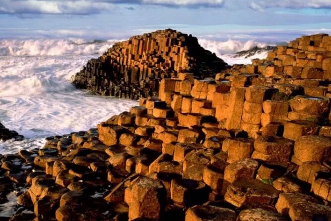 Giants Causeway with Private Chauffeur Day Tour from Dublin - Dunluce Castle: A Cliffside Ruin with Clan Drama
