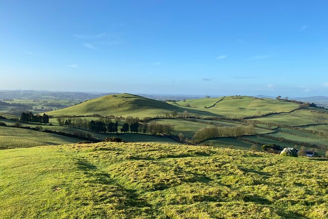 History & Heritage Tour: Kells, Trim, Loughcrew, Fore, Distillery - Kells: Round Tower, Crosses, and the Book of Kells Connection